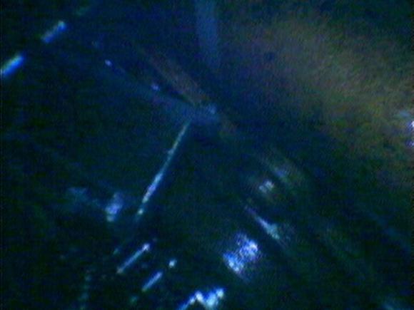 Primary tensioner shoe laying across chain