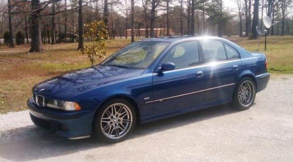 2000 BMW M5 with 3400 miles on it.  Still smells new inside.