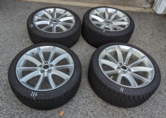 The 4 wheels and tires for sale (note tires numbered with tape for comparison in the photos