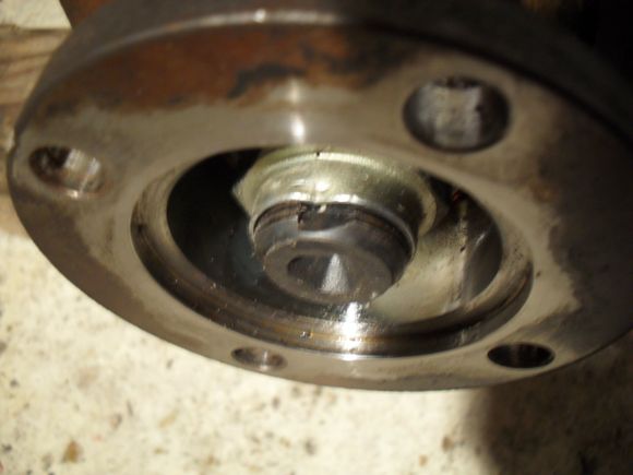 The pinion nut is deformed onto the thread so this needs to be eased out to undo the nut.