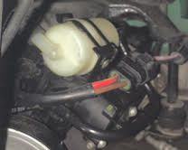 Suspension Compressor (in front of LHF Wheel; Inner fender liner removed)