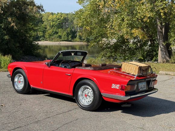 It was a neat little convertible for picnics and outings.  She sported her original Pimento Red body color and the seldom seen Chestnut brown interior.
