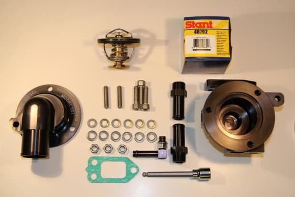 COMPLETELY DISASSEMBLED MODEL 001 ENGINE THERMOSTAT ASSEMBLY FOR THE V.M. MOTORI R428 TURBO-DIESEL ENGINE