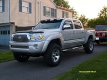My regular ride, 2005 Tacoma, 2 1/2&quot; Toytec coils, 33&quot; MTR's on DC 17' chrome wheels. (plus another 3K in aftermarket mods)