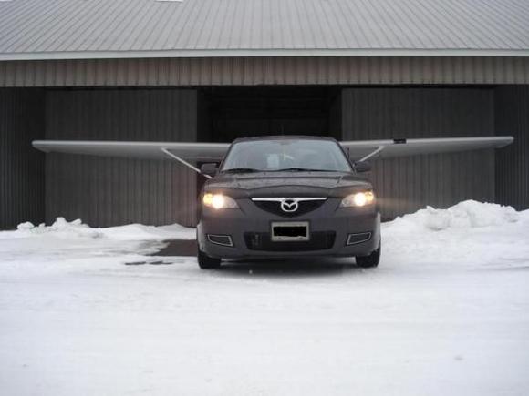 THE CAR HAS FRIGGIN WINGS WOOHOO