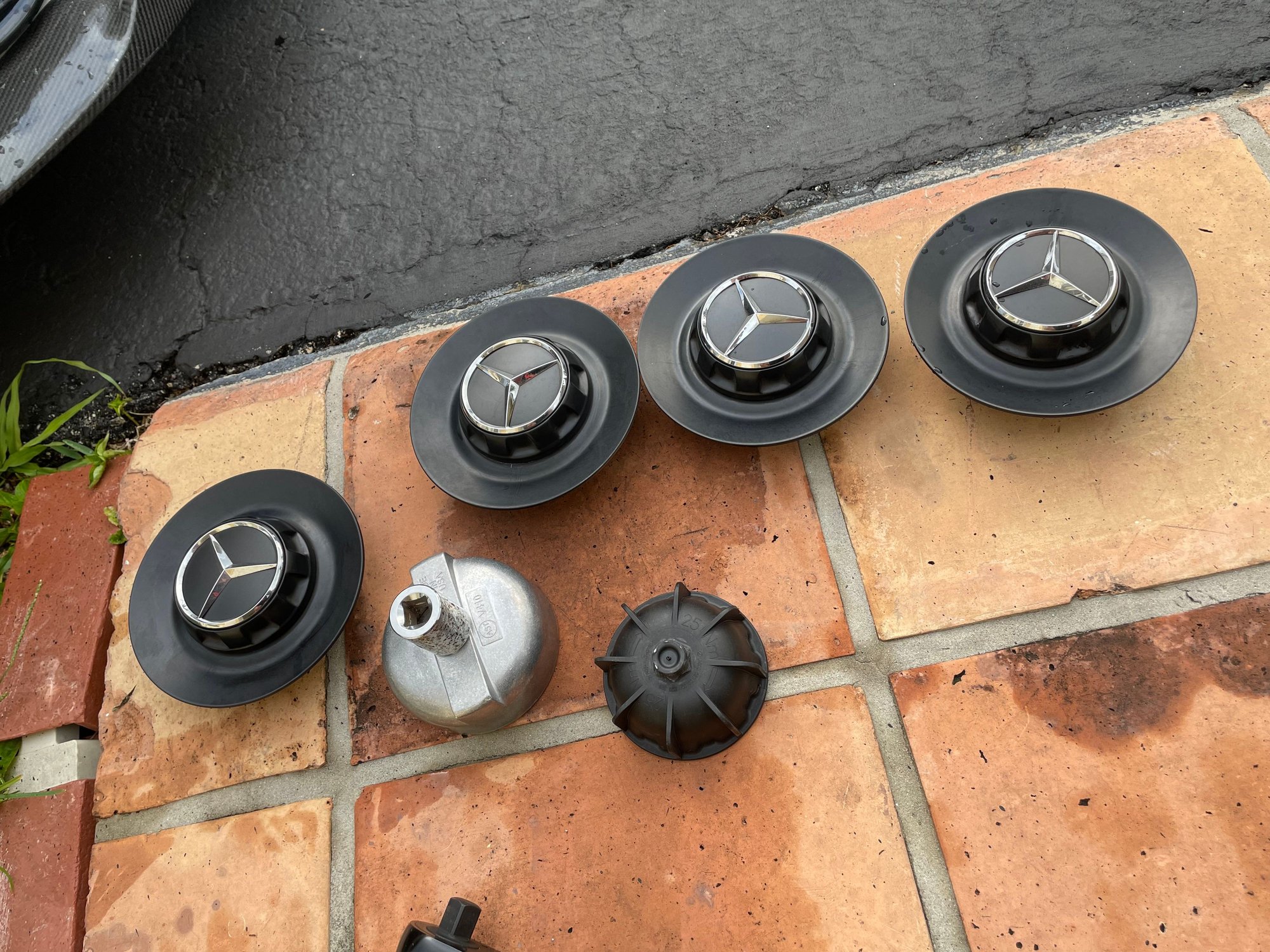 Plastic Spanner Tool to Remove Center Cap is Garbage Forums