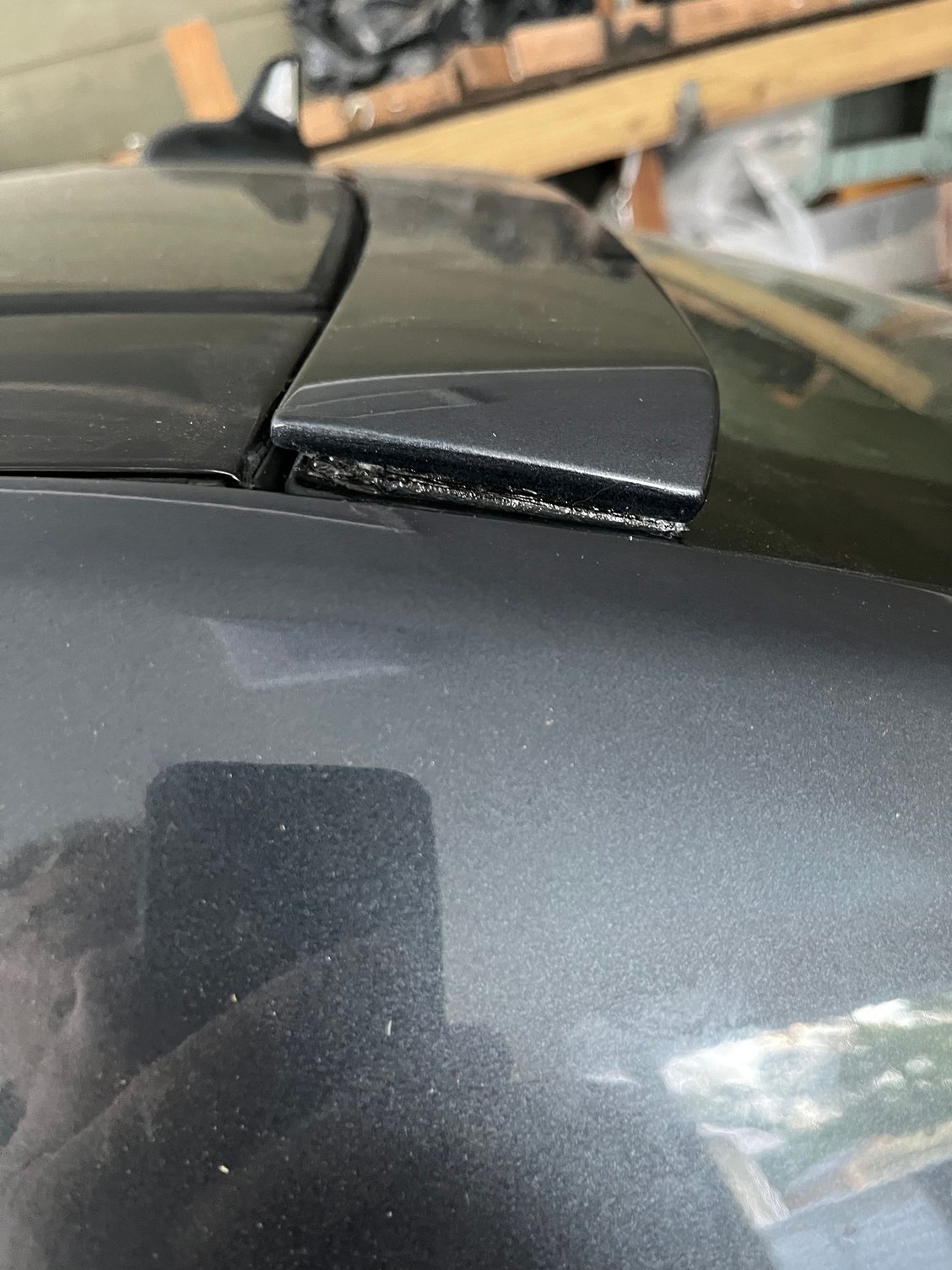 Window spoiler after using clear Lock Tite glue. 