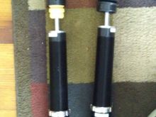 Both rear struts/shock absorbers