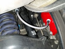 As you can see the rear brake hoses are perfectly fine when the car sits on the ground. There is only tension, when the car is jacked up (or when getting airborne). Almost long enough, but for longevity needs to be made a bit longer.