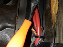 Now I'm using a pick to pry the plug out from inside footwell area...it was difficult to remove....stuck good and very limited working space..also used needle nose pliers and utility knife...