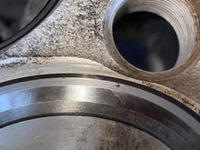 Noticed this AFTER first pass with 350 grit , it later went away with 450/700 & I finished with 1000 grit , I did the same process for all the other valves by hand no drill . Hit them all with 350/450/700/1000 grit diamond lapping paste . This was the only valve seat that had this problem 