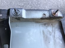 Looking upside down, bottom of right fender, 17 years old, Buffalo, NY. Mild/very limited snow use since 2011…
