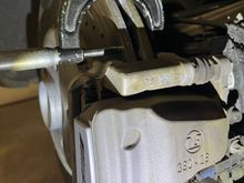 Measuring rear rotor thickness. 25.84mm after 21600 miles.