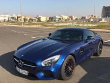 Dark blue Mercedes-Benz AMG GTS along with other supercars in Kuwait.