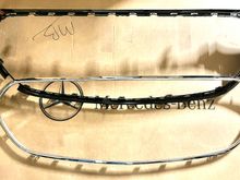 Chrome grille trim separated from frame without breaking any tabs.