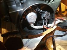 Here's how the wiring looks on the inside, grommet on the dust cap