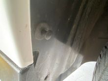 3 fasteners in rear wheel well; 4th one is underneath 