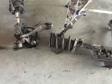 C63amg front suspension but i only used the mounting plates. So I didn't used a bracket.