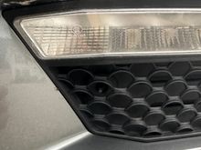 Pfl 63. Every Mercedes I’ve had 03-13 had has had it in the same place. You can even see the little hole right next to your fog light. And quite honestly, that fog light doesn’t look proper because Mercedes does not leave external screws like that. 