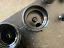 Top port is plugged with carbon