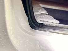 Again, weather stripping tucked into the panel gap