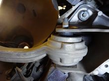 Here you can see the offset of the fluted bolt in the control arm - you should note this for re-assembly
