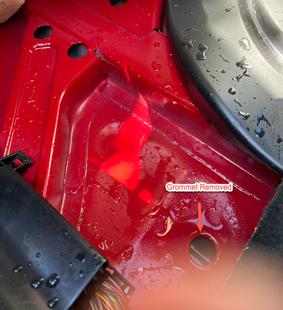 Drain plug (grommet) removed