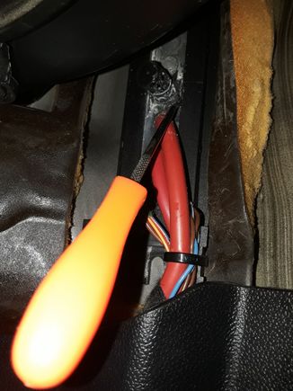 Now I'm using a pick to pry the plug out from inside footwell area...it was difficult to remove....stuck good and very limited working space..also used needle nose pliers and utility knife...