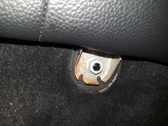 My back seat doesn't just pop up like others... there are 4 of these 13mm nuts that have to come off first. 