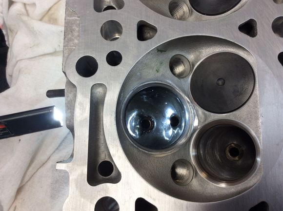 Coated exhaust port