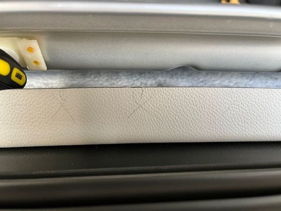 Feel the underside of headliner for the former attachment points and the hidden support arms inside headliner, I marked those with pencil, as the flat gaps in between are the targets for Velcro tape.