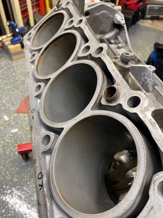 Here is a photo meant to depict a before and after example of lapping the aluminum engine block cylinder walls. The aluminum actually has 30% silicon content and a process using felt pads on a hone coated with alusil honing paste(the cylinder walls also get coated with the paste and regular engine oil in the process) brings forth the silicon for the piston rings to slide on. The silicon is much more durable than the aluminum alone which is part of the reason m113’s typically last a long time