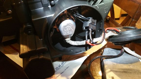 Here's how the wiring looks on the inside, grommet on the dust cap