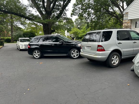 The Mercedes fleet in my driveway
