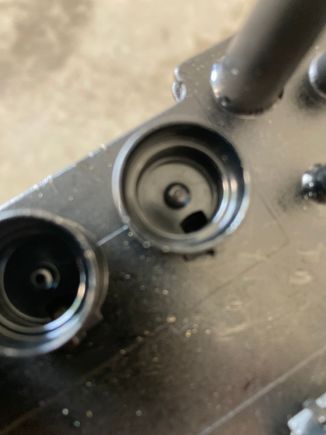 Top port is plugged with carbon