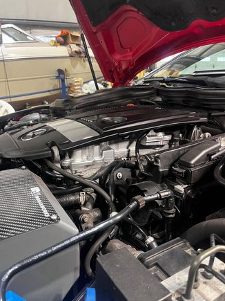 Side view of the aluminum valve cover. Looks very factory.