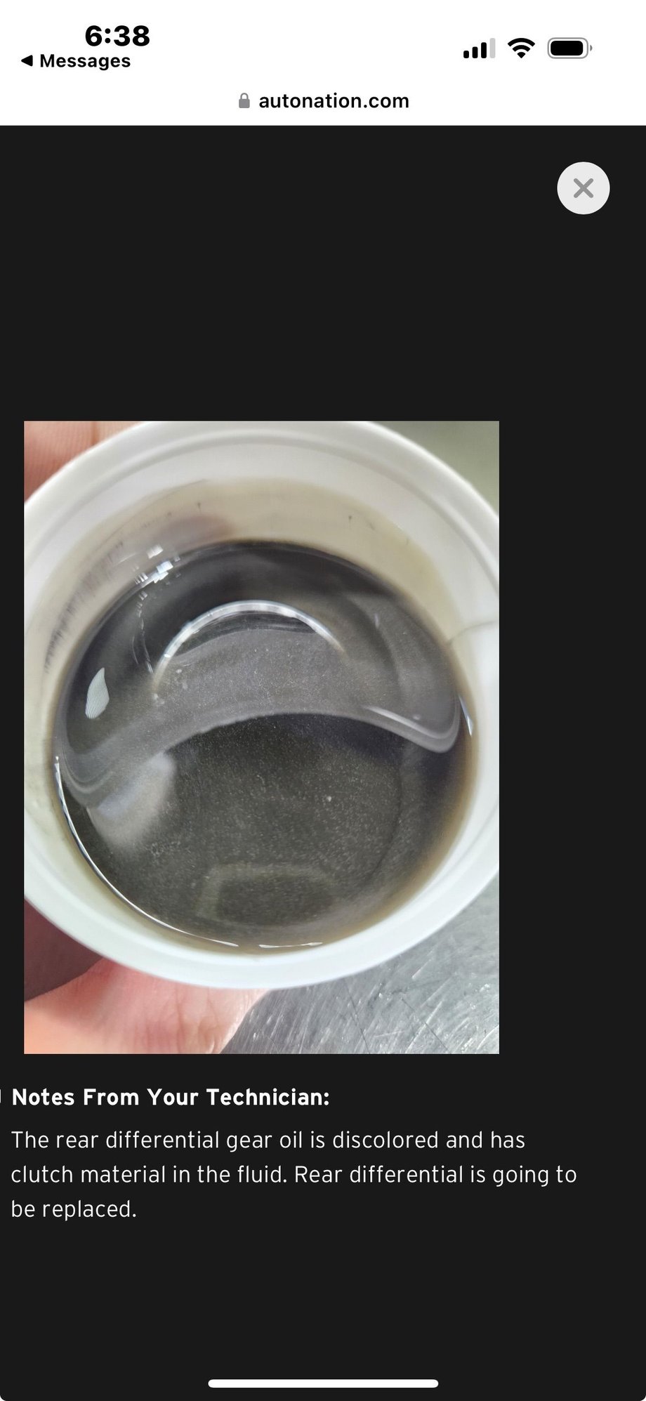 Gear oil silvery/dark and burning smell - not okay 
