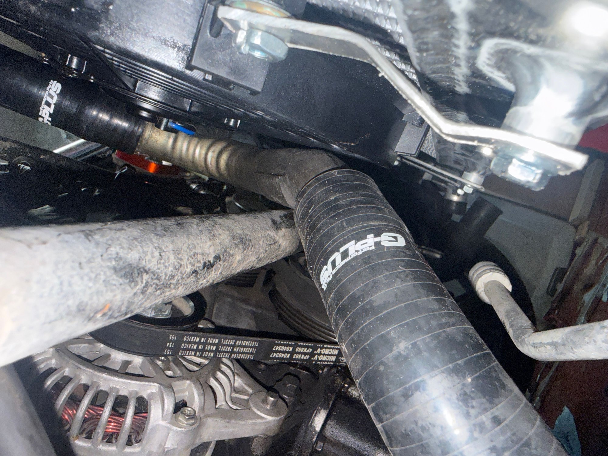 Hard to cut the mounting tab for the lower radiator pipe but it works! Just need to throw on some clamps. 