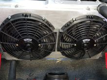 A custom fan shroud holds two 12" no name fans.