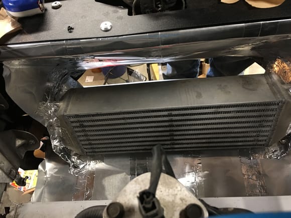 The back of the box lines up the finned area of the radiator but not wide enough to hit the side tanks. This is the edge where I'll put weather stripping to seal up to the radiator