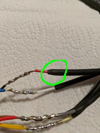 Oops! I let the wires heat up too much and activated the heat shrink...had to cut the ends to slide them over the splices.