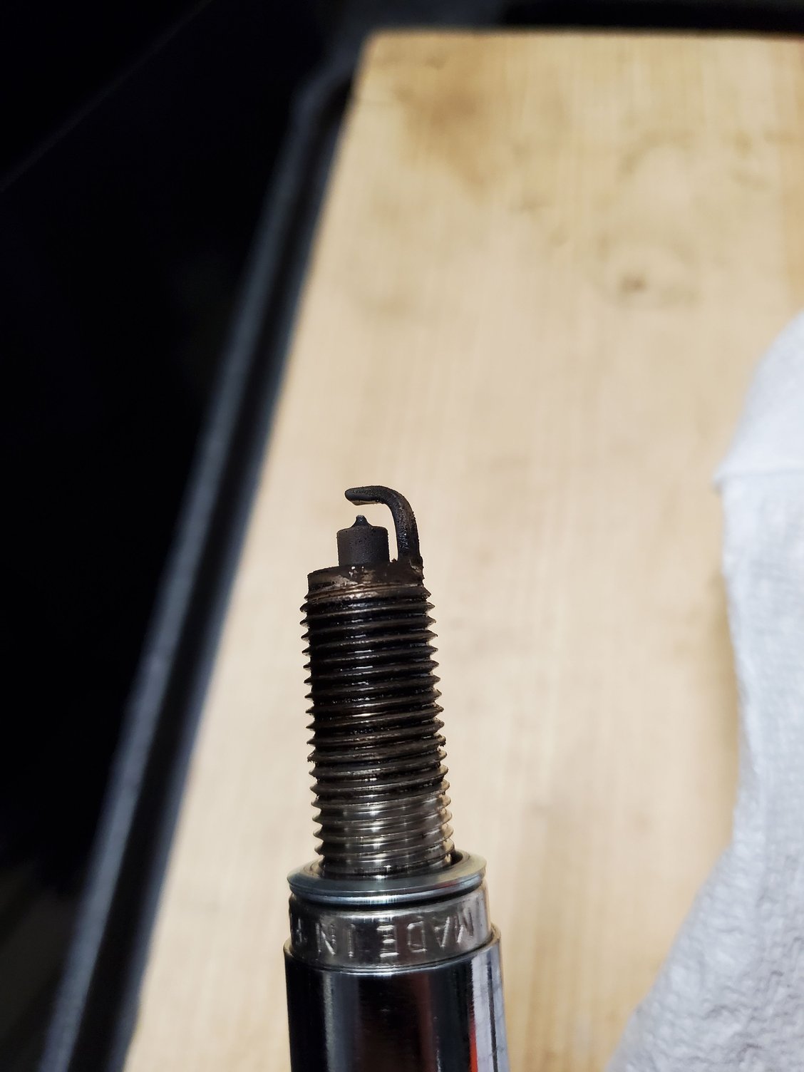 Oily Spark Plugs and Corrosion on Terminals North American Motoring