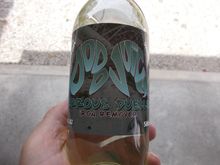 After rinsing and washing the car to remove loose grit, dirt, etc, I treat the car with DoDo Juice's Ferrous Dueller to neutralize the iron particles. Be warned, the smell of this liquid will curl your toes!