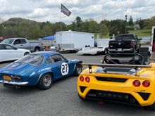 When a small car (yellow Lotus) is made to look large by an even smaller car…