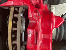 JCW caliper with a depression for compressing the pistons