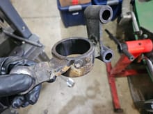 Here is the Front rear control arm bushing bracket with the old bushing pressed out.