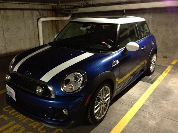 Complete with the black driving lights, JCW scuttles, and rho-plate mount for the front license plate.  Parked in its home!