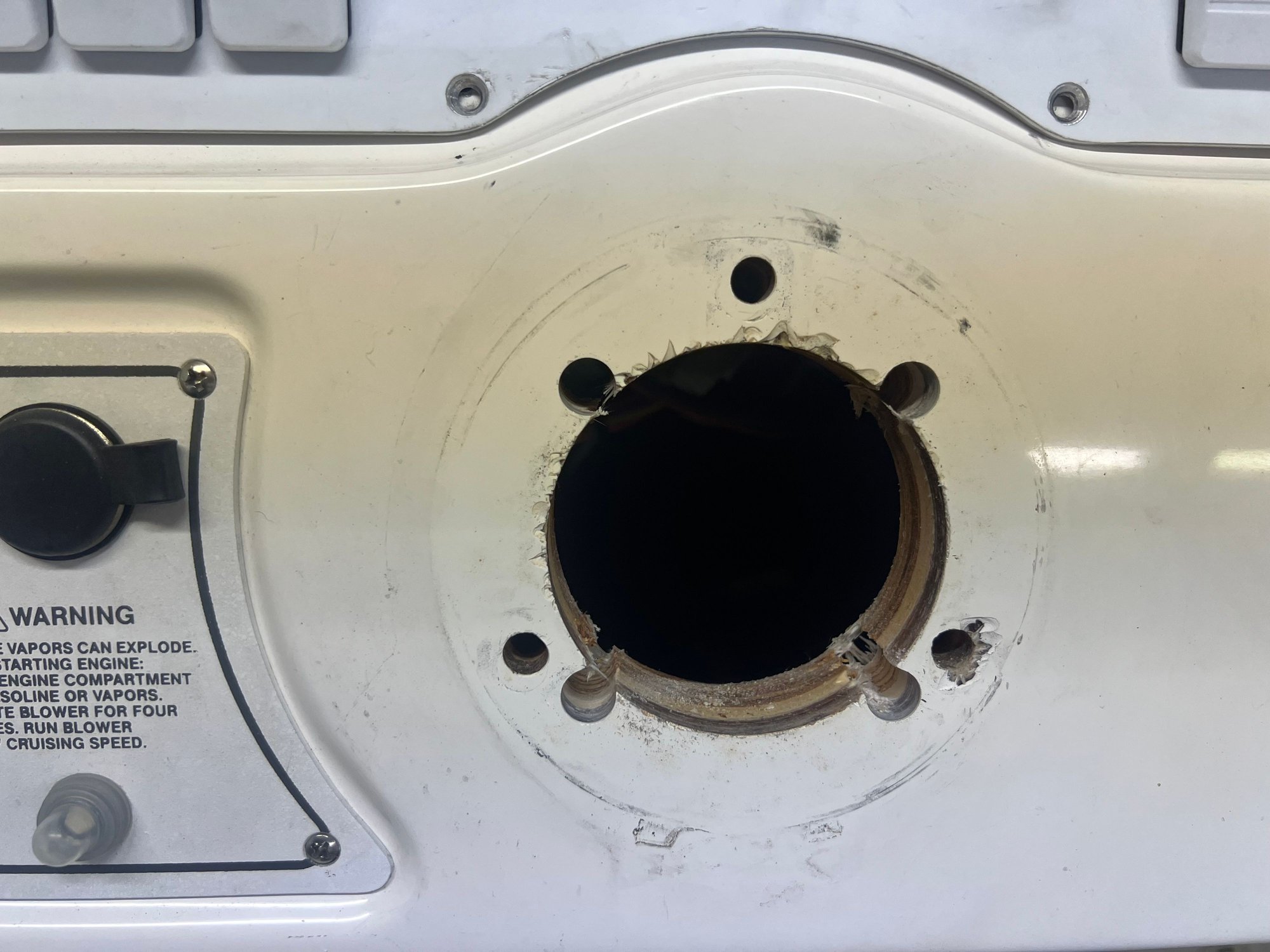 Holes drilled for helm. I’ll have to make a bezel to cover the holes from the old bezel.