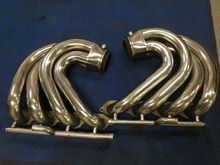 525 mercury headers , 525 bolt pattern . One header appears to have been repaired and other needs repair.  $1000 for the pair plus ride. 