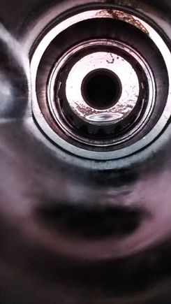 Where it was rubbing on the upper housing, zoom in, looks like an oring goes there.